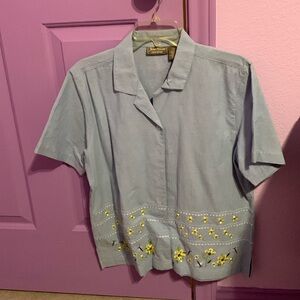 Light blue button-down top with yellow flowers